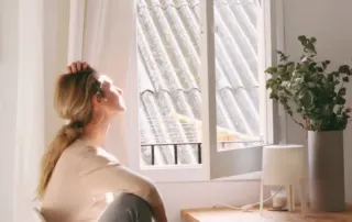 Woman staring into the sunlight